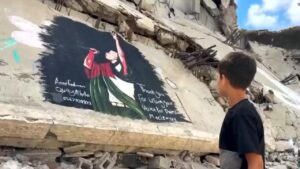 Gazatíes pintan un mural en honor a Macklemore tras ser excluido de la gira de Ed Sheeran